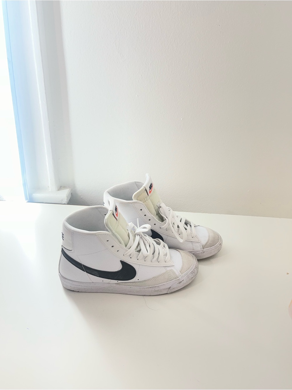 Nike Kids White High-Top Sneakers with Black Swoosh